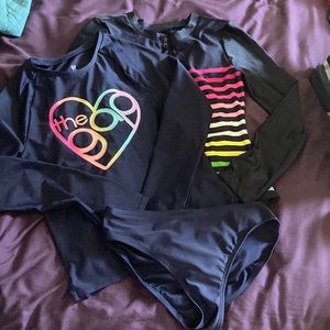 Two girls Gap rash guards size large (approx 10) in excellent condition.